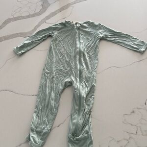 Sea foam green Kyte Baby zip up onesie.